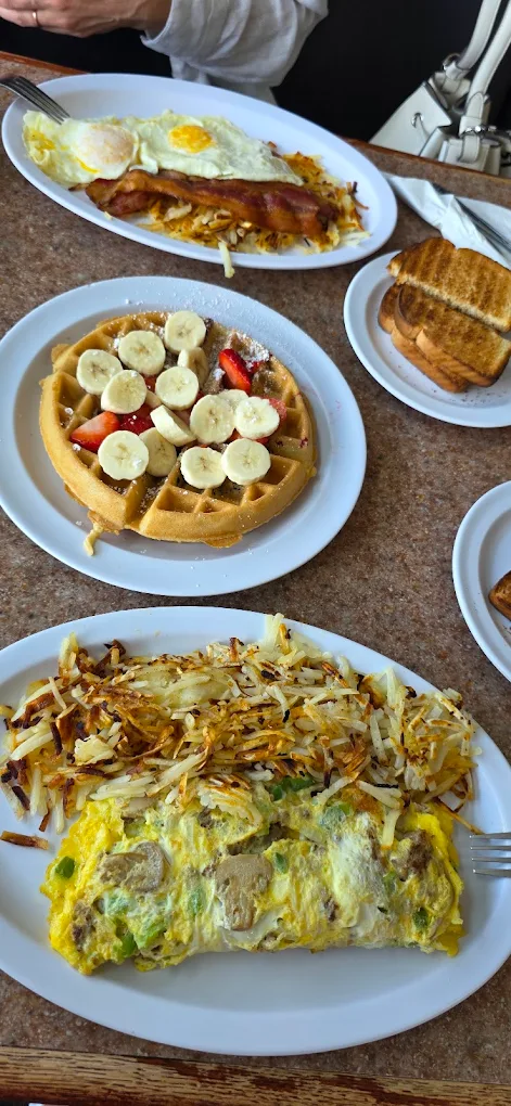 Fresh breakfast spread on the table at Toasted Cafe