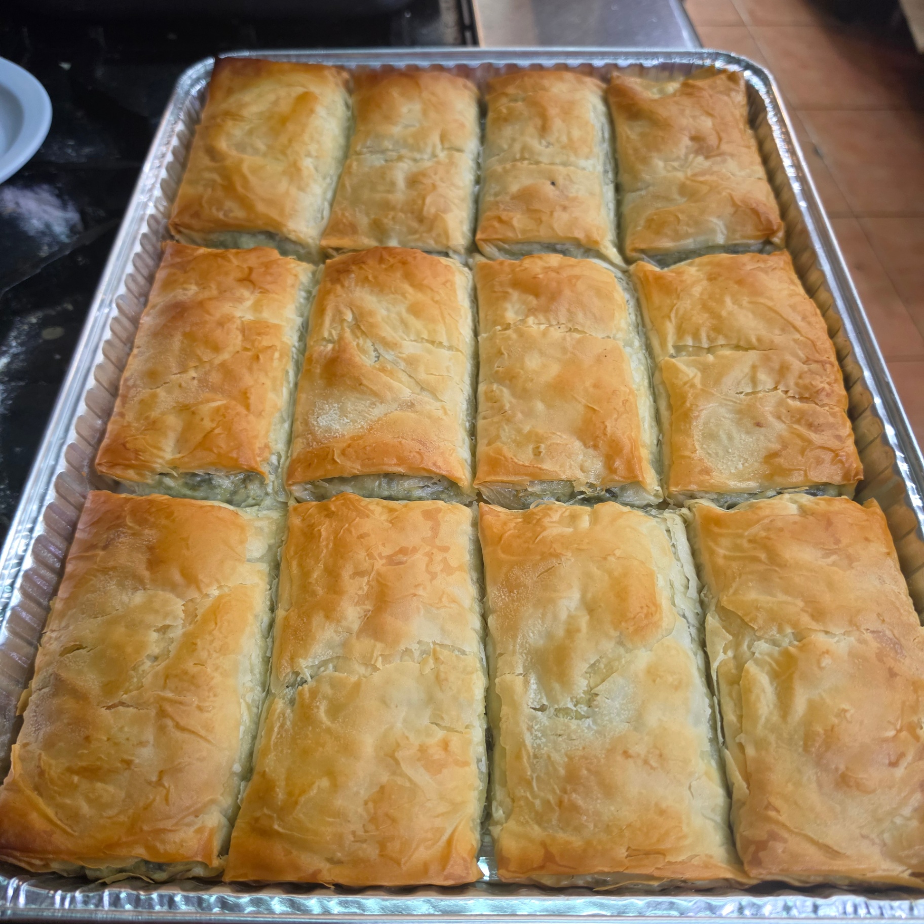 Fresh baked spanakopita tray